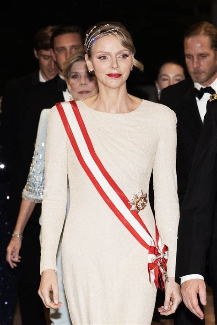 Charlene, Princess of Monaco wearing white garments on an official state visit to the Vatican in 2016
