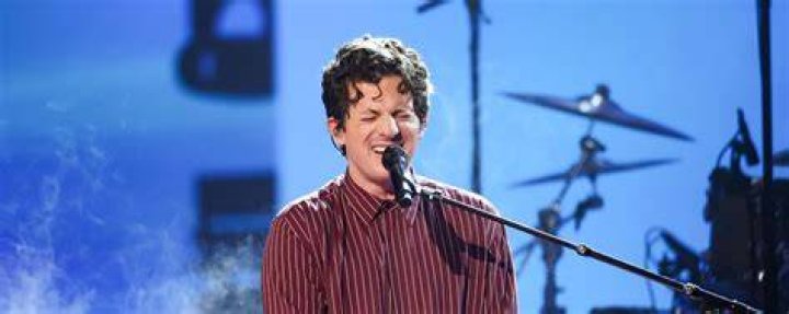 Charlie Puth's shirtless body on display