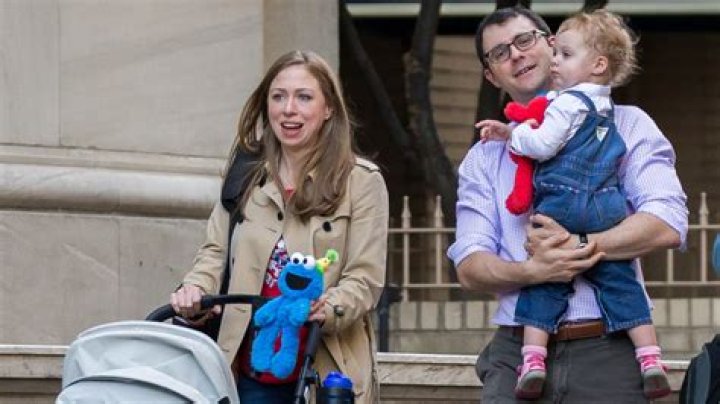 Chelsea Clinton with Marc Mezvinsky while listening to Bill Clinton's speech in 2016