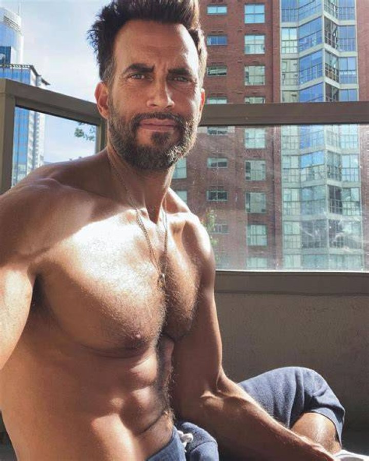 Cheyenne Jackson shirtless poses for a modeling photoshoot in 2016