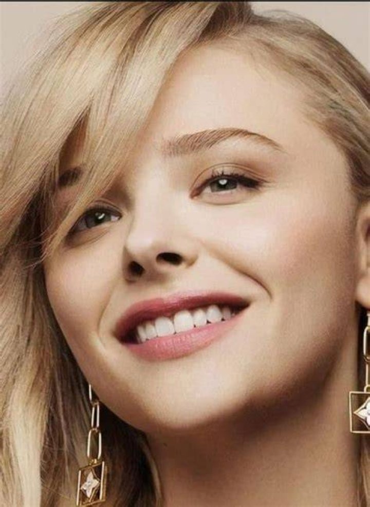 Chloe smiling for the camera in March 2023