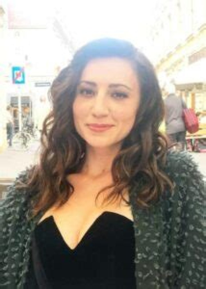 Christy Williams as seen while smiling for a picture after enjoying a delicious meal in Vienna, Austria