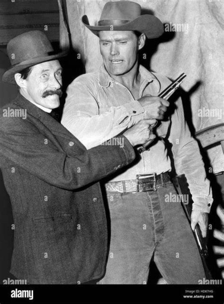 Chuck Connors (Left) as John Egan and guest star Broderick Crawford in the television program 'Arrest and Trial' (1963)