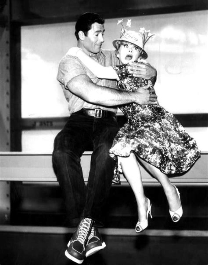 Clint Walker and Lucille Ball as seen in a publicity photo from the television program 'The Lucy Show'