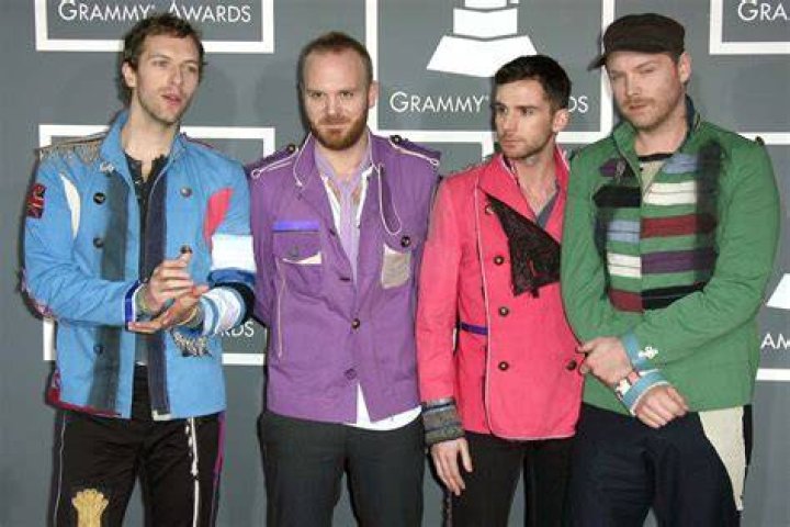 Coldplay members Will Champion, Guy Berryman, Chris Martin and Jonny Buckland at 2015 iHeartRadio Music Festival