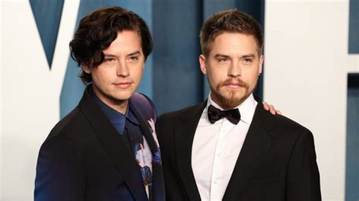 Cole Sprouse and Dylan Sprouse pose for a photo with George Caceres before teaching a Master Workshop on acting, hosted by Celebrity Talent Academy and Starlight Children's Foundation.