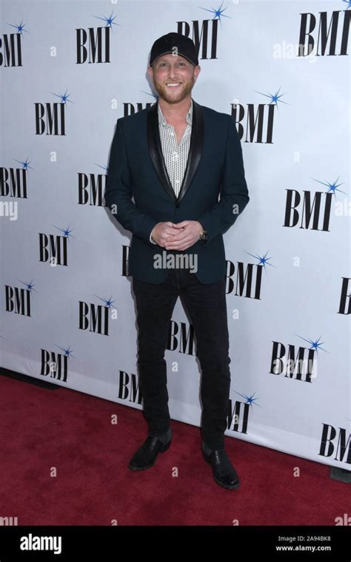 Cole Swindell in November 2019 caught between two ferns after the party