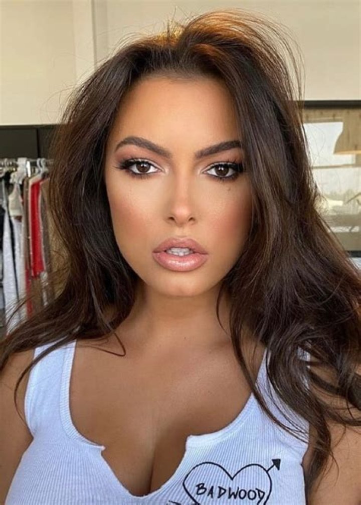 Constance Nunes posing for a picture along with her husky Buff in Wrightwood, California in December 2019