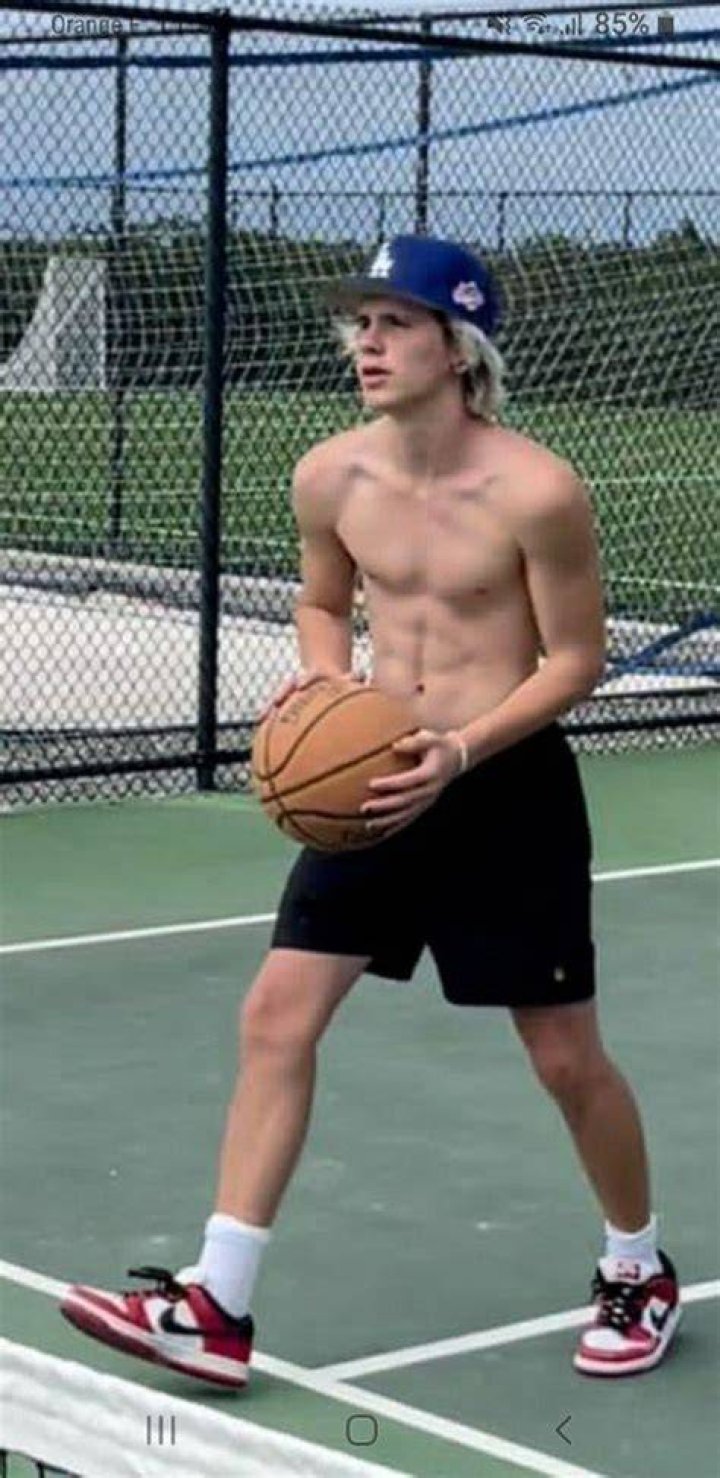 Cruz Beckham playing basketball
