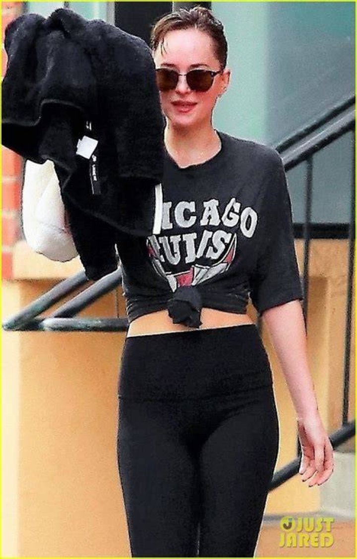 Dakota Johnson after workout heading towards parking lot