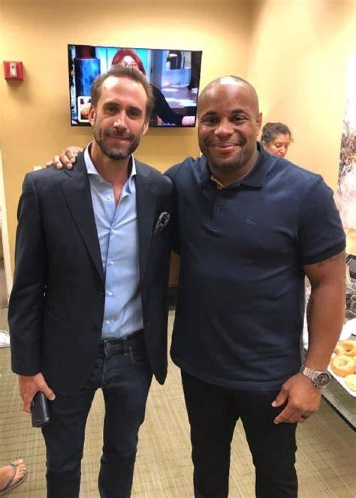 Daniel Cormier with Joseph Fiennes in July 2018