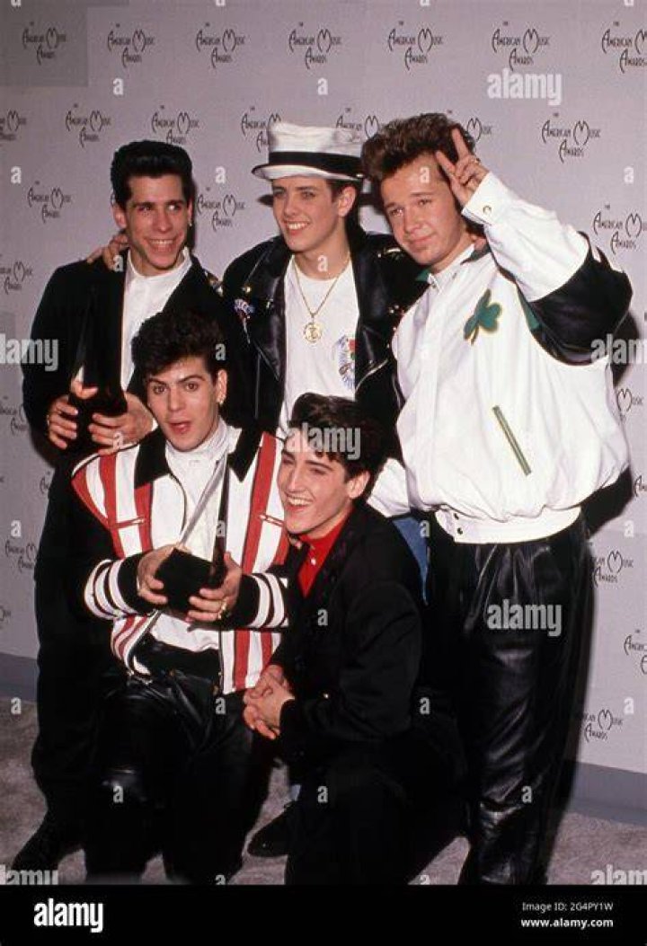 Danny Wood, Jordan Knight, Donnie Wahlberg, Joey McIntyre, and Jonathan Knight performing at the European Tour in 2014