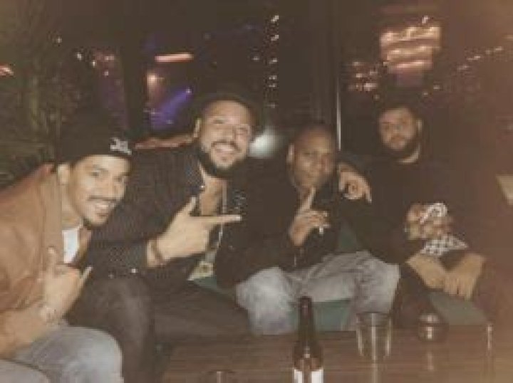 Dave Chappelle (Second Right) enjoying his time in October in 2018