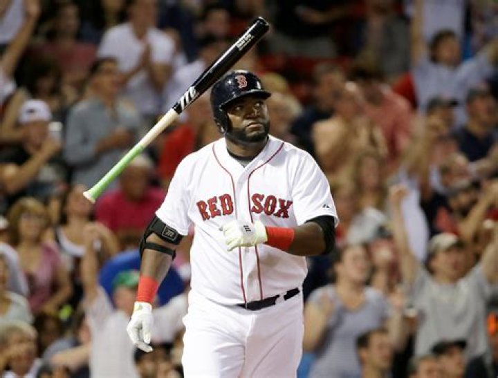 David Ortiz of the Boston Red Sox points to his own name after hitting a home run in 2007
