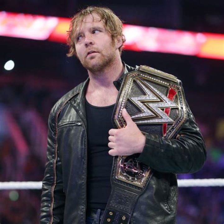 Dean Ambrose standing by the ring in July 2013