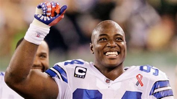 DeMarcus Ware (Left) as seen while sharing a moment with his coach