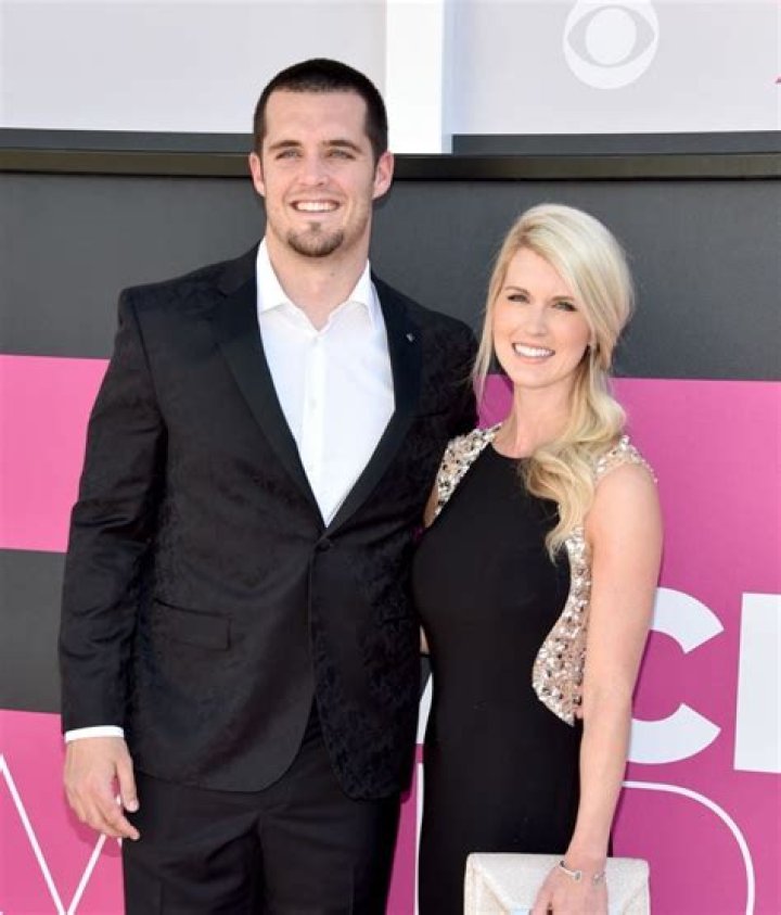 Derek Carr with his wife, Heather Carr, in July 2018
