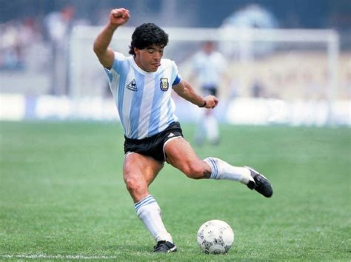 Diego Maradona controls the ball during a friendly match for Argentina in 1989