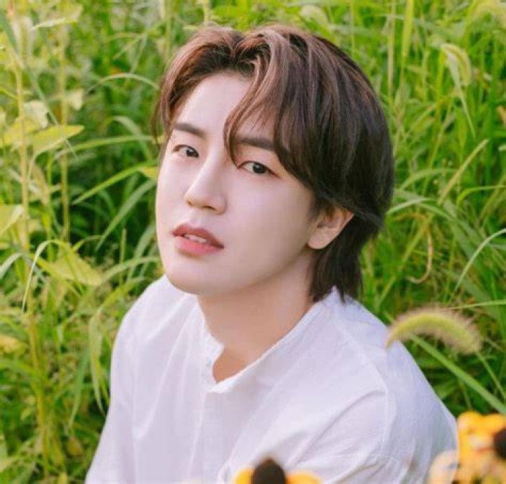 Donghun as seen while posing for the camera in August 2021