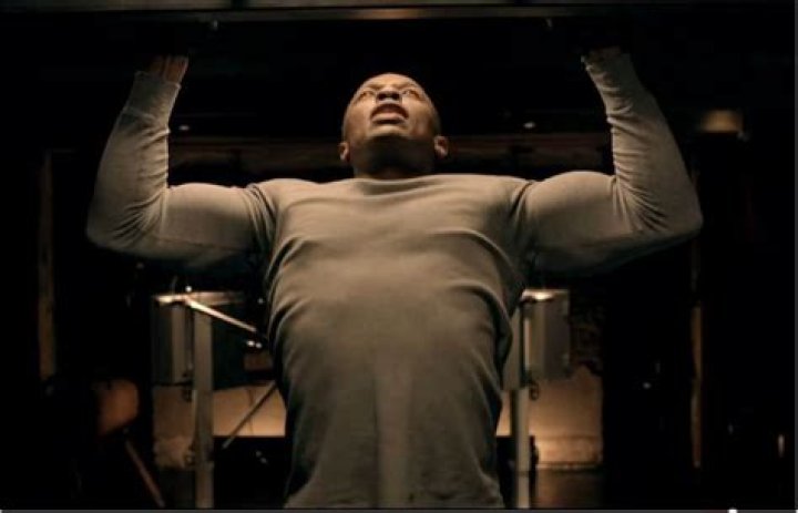 Dr. Dre doing pull-ups