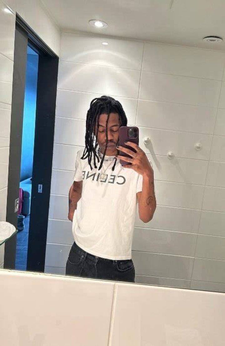 Dro Kenji as seen while smiling for a picture in November 2022