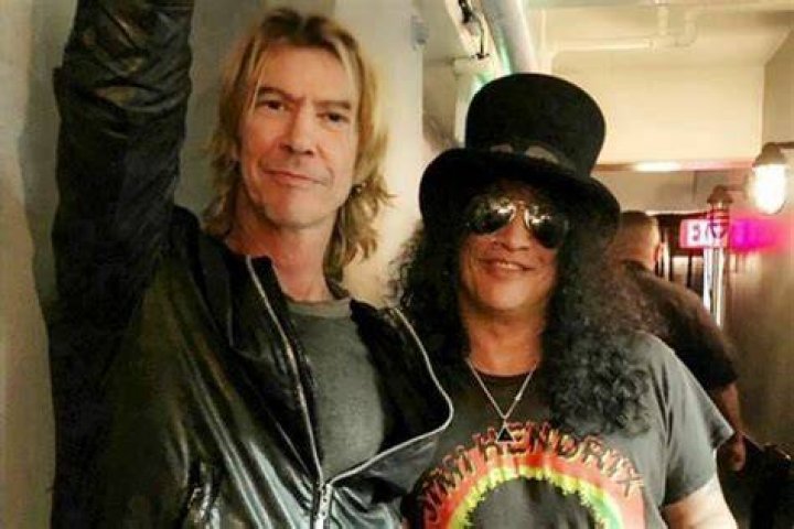 Duff McKagan (Left) and Slash performing in 2018
