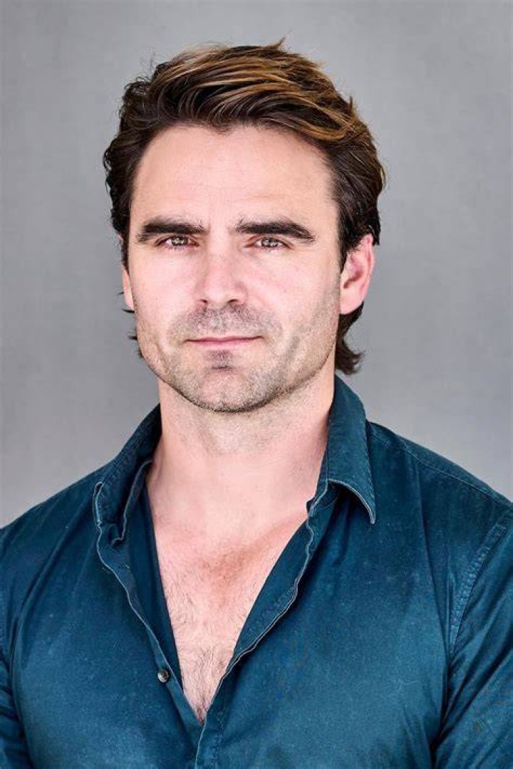 Dustin Clare as seen while posing for the camera during an event in March 2013