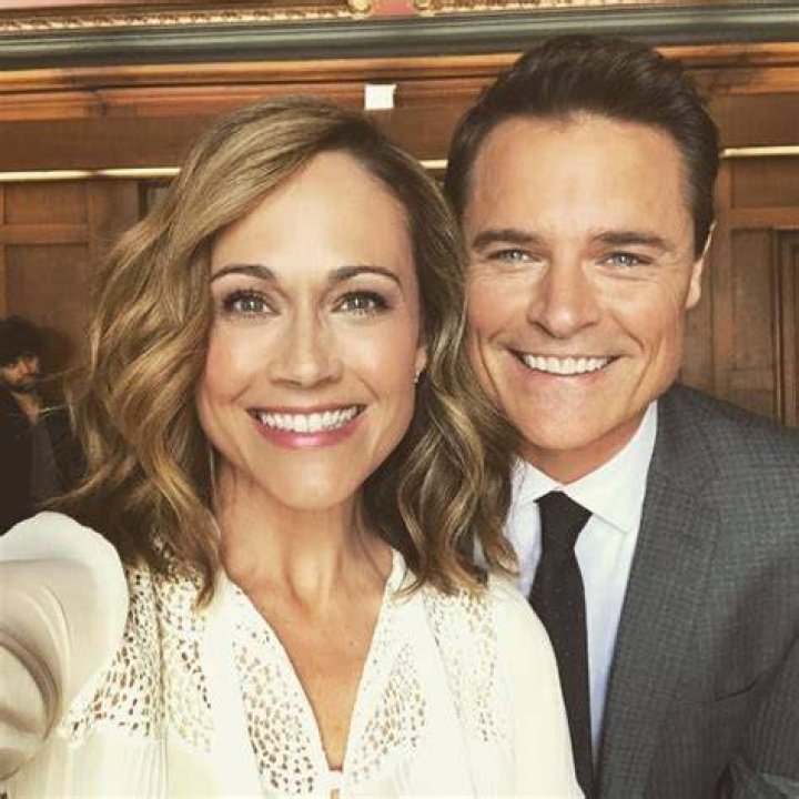 Dylan Neal as seen while posing for a picture along with his wife, Becky Southwell, in December 2014