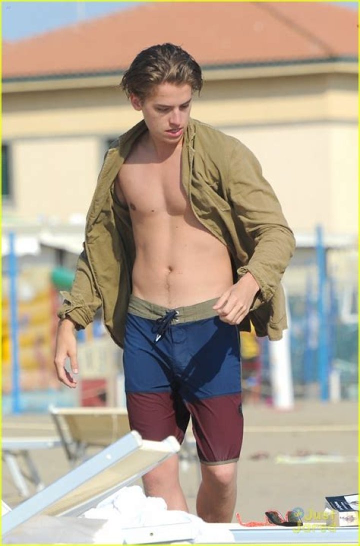Dylan Sprouse shirtless on an Italian Beach.