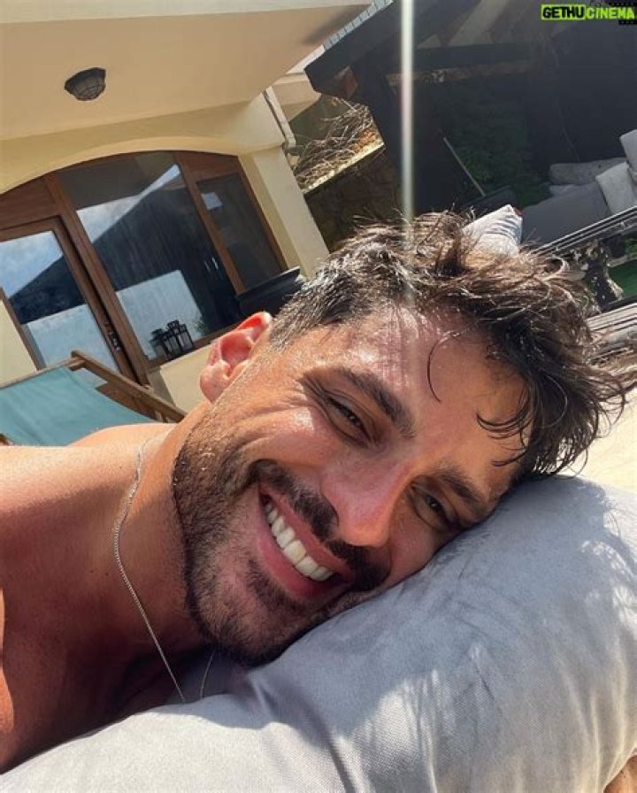 Ekin Mert Daymaz having fun with his pet dog in February 2019