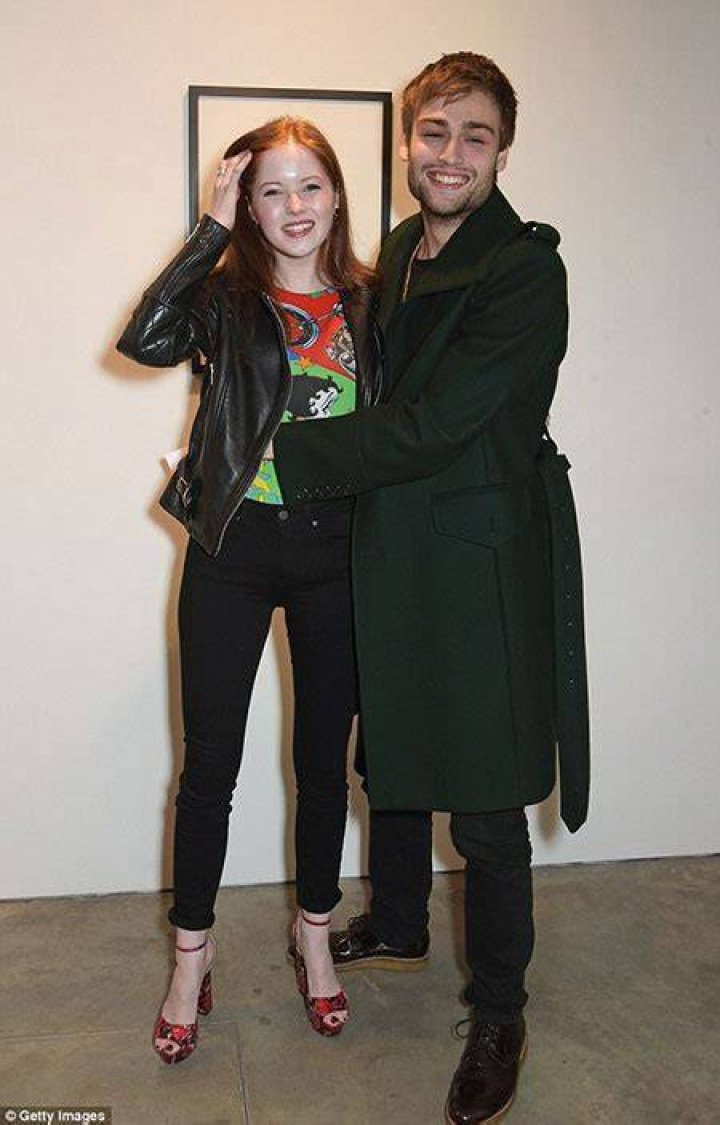 Ellie Bamber with Douglas Booth at Modern Art Exhibition in Central London in April 2015