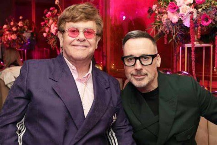 Elton John and his spouse David Furnish with their 2 children