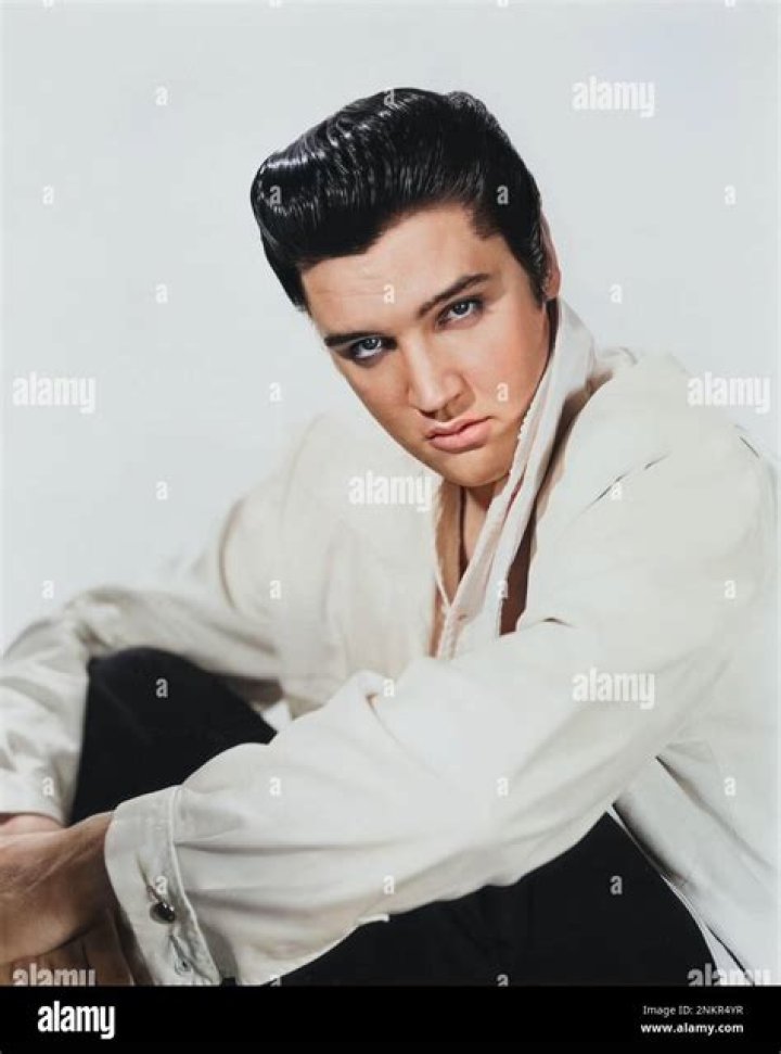 Elvis Presley posing for 1957 film Jailhouse Rock