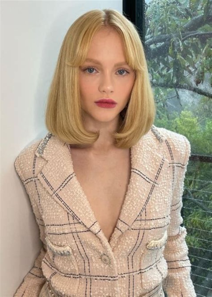 Emma Laird modeling for Vivienne Westwood in 2021