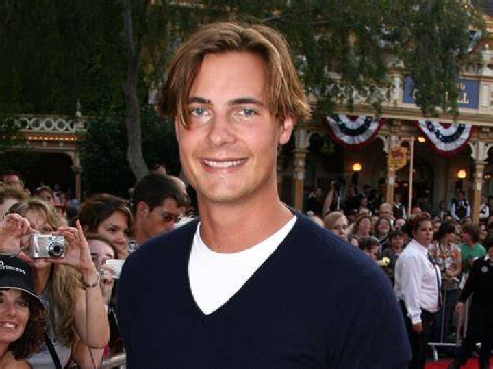 Erik von Detten smiling for a picture alongside his family in Marina del Rey, California