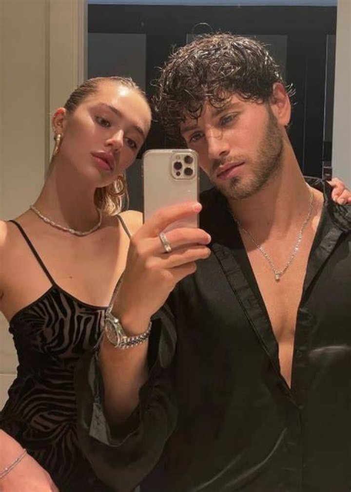 Eyal Booker clicking a mirror selfie with Delilah Belle