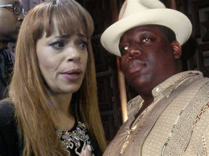 Faith Evans smiling in a picture alongside Dj Flava