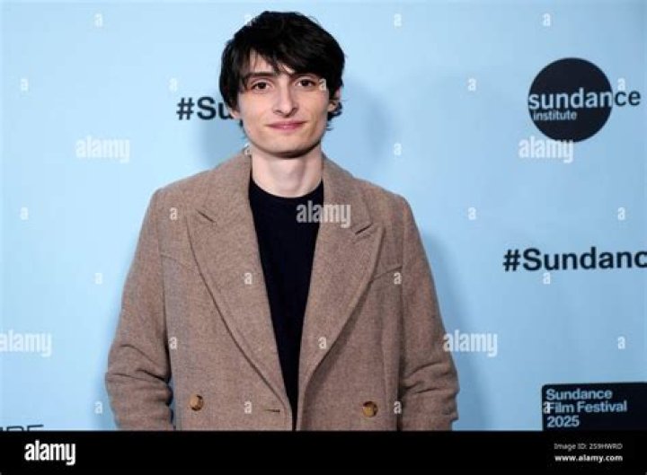 Finn Wolfhard [Center] at The Weinstein Company and Netflix Golden Globes Party in January 2017
