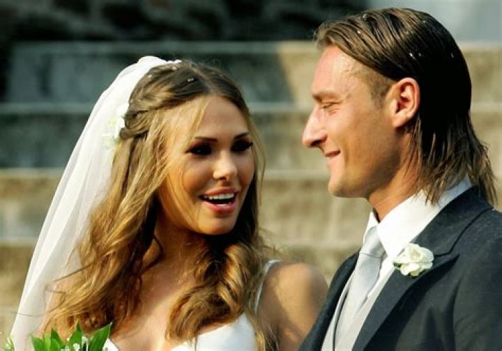 Francesco Totti and wife Ilary Blasi on the Miami beach, Florida on June 7, 2012