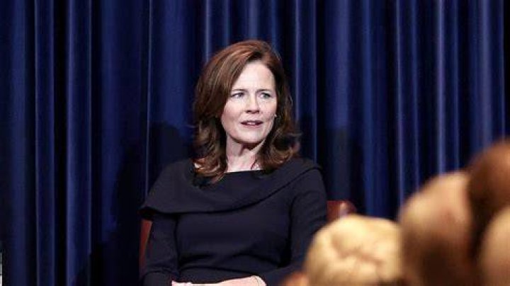 From Left - Amy Coney Barrett, Jesse M. Barrett, President Trump, and Supreme Court Associate Justice Clarence Thomas at the swearing-in ceremony of Judge Amy as Supreme Court Associate Justice in 2020