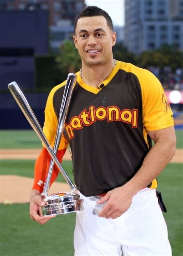Giancarlo Stanton holds up the T-Mobile #HRDerby trophy in a picture taken on July 11, 2016