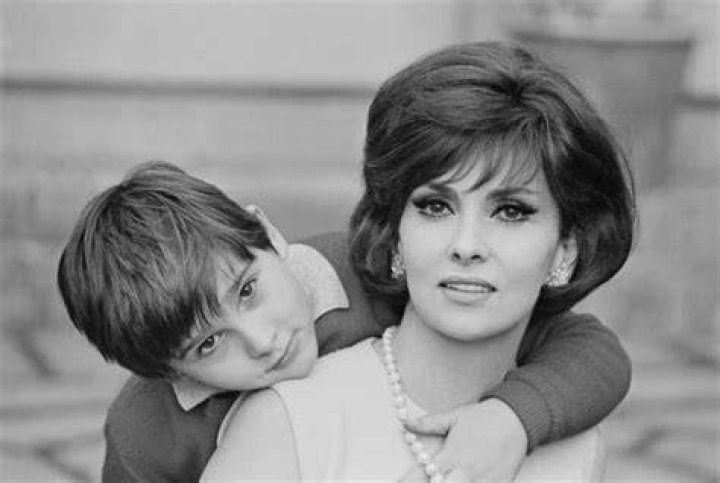 Gina Lollobrigida pictured with her son Andrea Milko in Rome at the Piazza Navona Christmas market in 1962