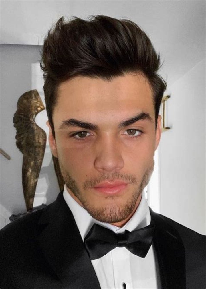 Grayson Dolan wearing a bow tie in a June 2019 selfie
