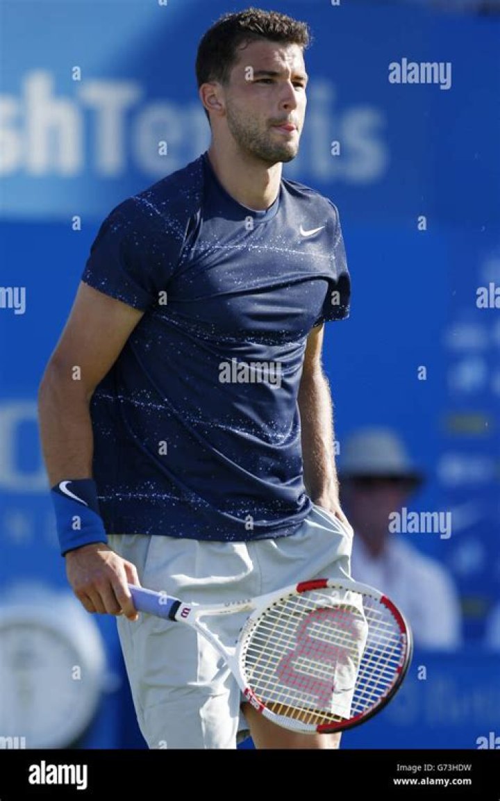 Grigor Dimitrov playing during Aegon Championships in 2014