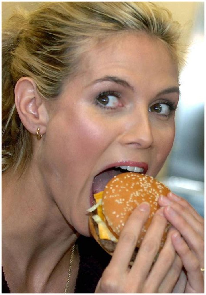 Heidi Klum eating food