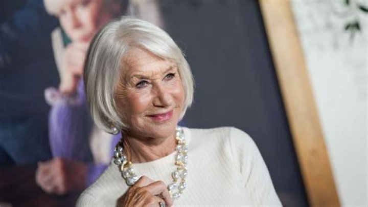 Helen Mirren (Center) with her hair and makeup team members in March 2018