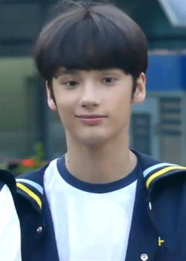 Huening Kai as seen while posing for the camera at Tomorrow X Together's debut showcase in March 2019