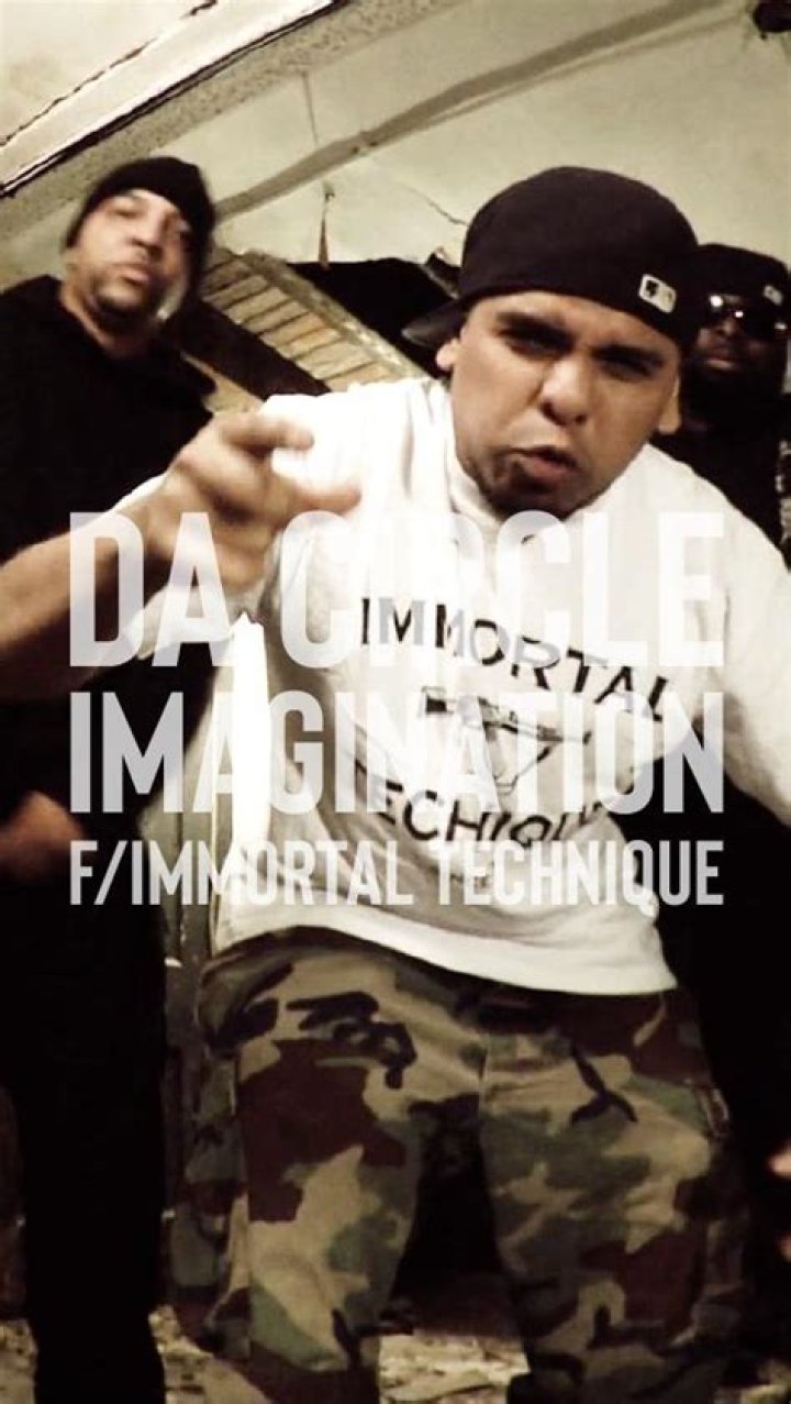 Immortal Technique posing for the camera