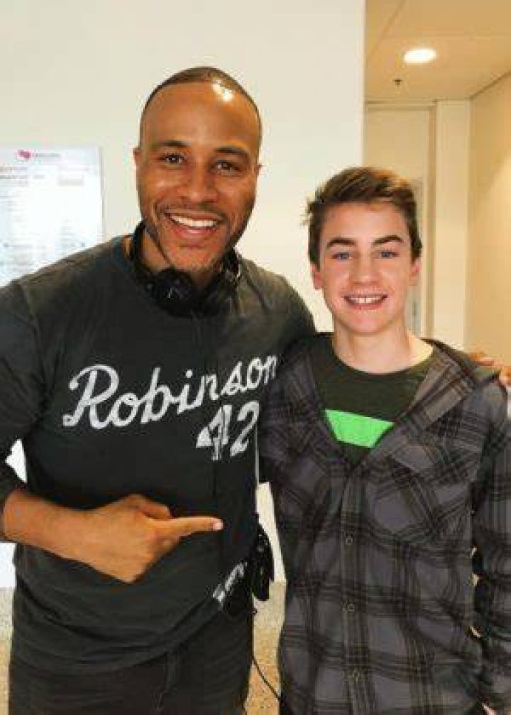 Isaac Kragten (Right) as seen while posing with the producer of the movie 'Breakthrough', DeVon Franklin, in April 2018
