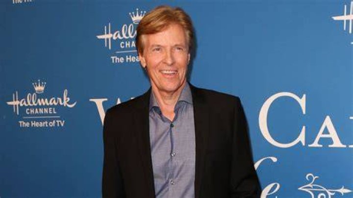 Jack Wagner smiling for a picture alongside 5 FM and SABC3 Expresso reporter Jen Su in November 2012